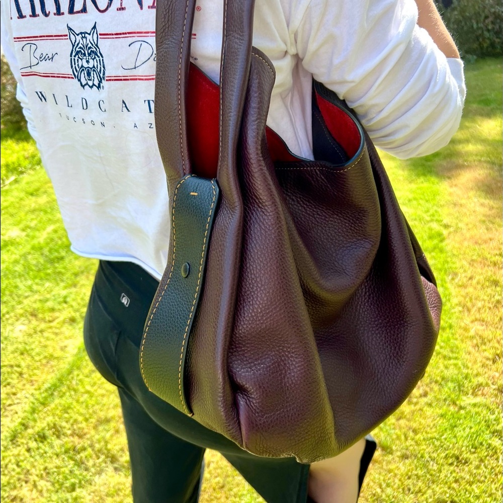 Leather 2-in-1 slouch Coach shoulder bag with removable inner bag.